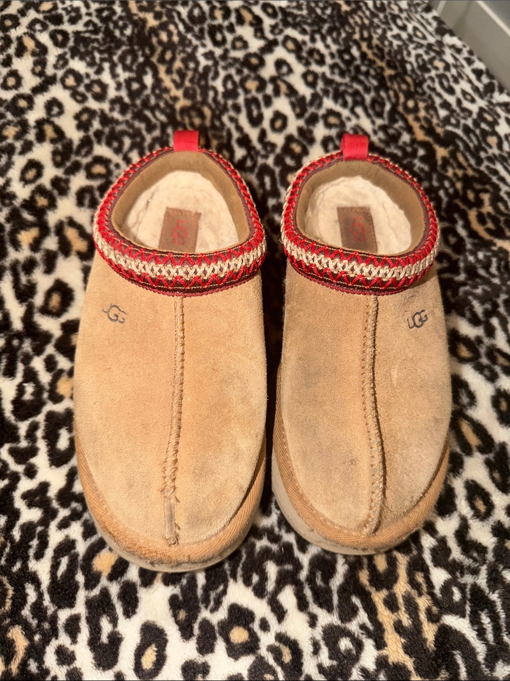 UGG Kids Chestnut Slip-On Shearling Lined Slippers with Red Trim